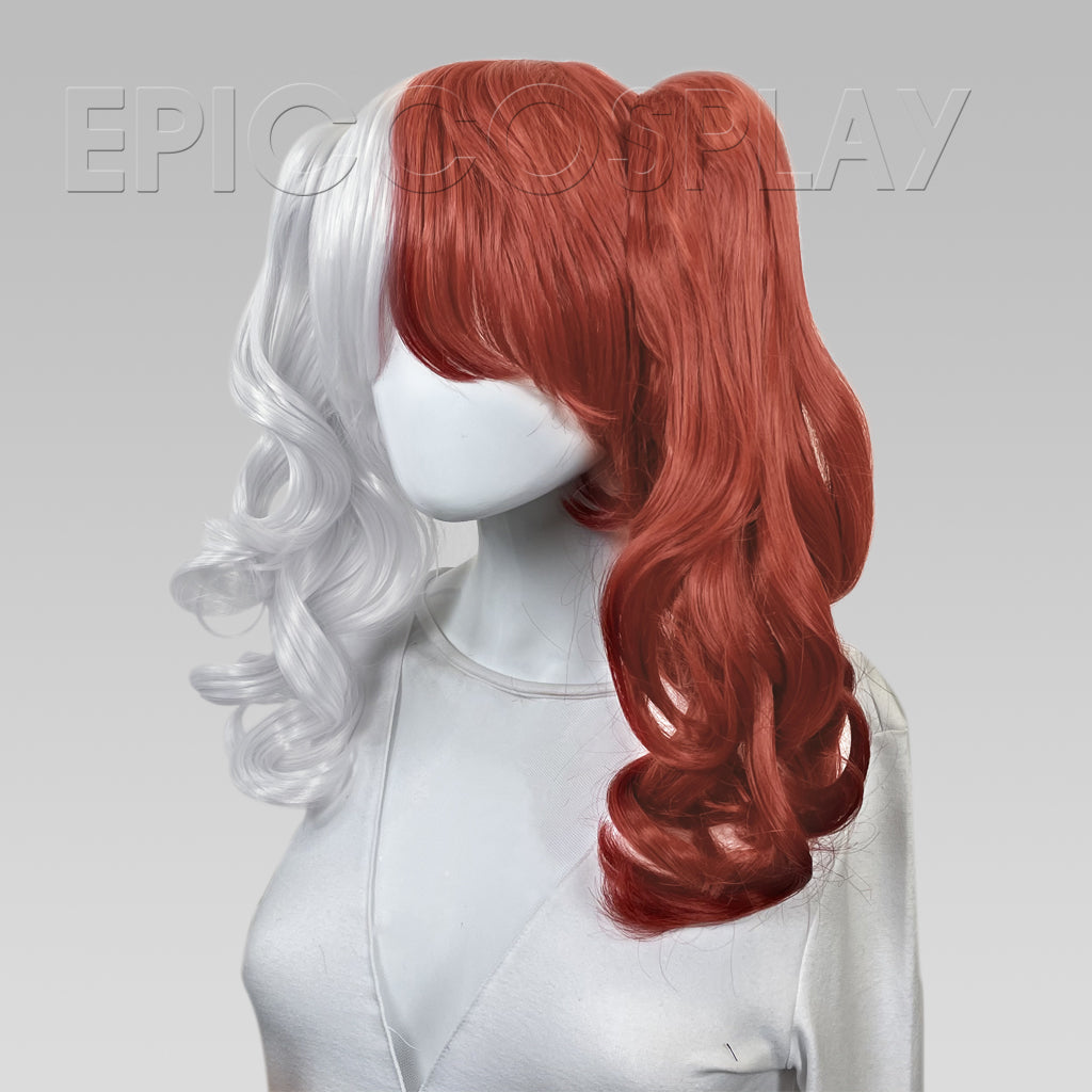 red wig and a silver dress Red wig and a silver dress? I don't think